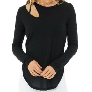 Alo Yoga Black Ribbed Peak Long Sleeve Top. Size small. Brand new with tags.